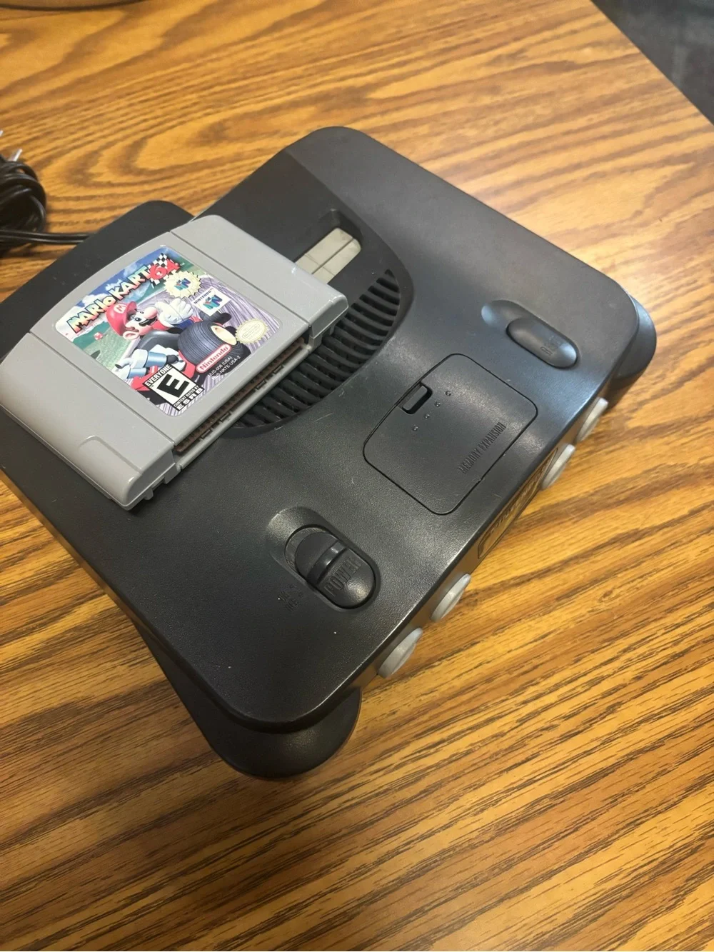 Nintendo N64 Console with Gray Mario Kart 64 Cartridge and Black Power Adapter